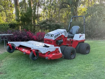 Ventrac 4520P fitted with the finish mower deck, parked on lawn