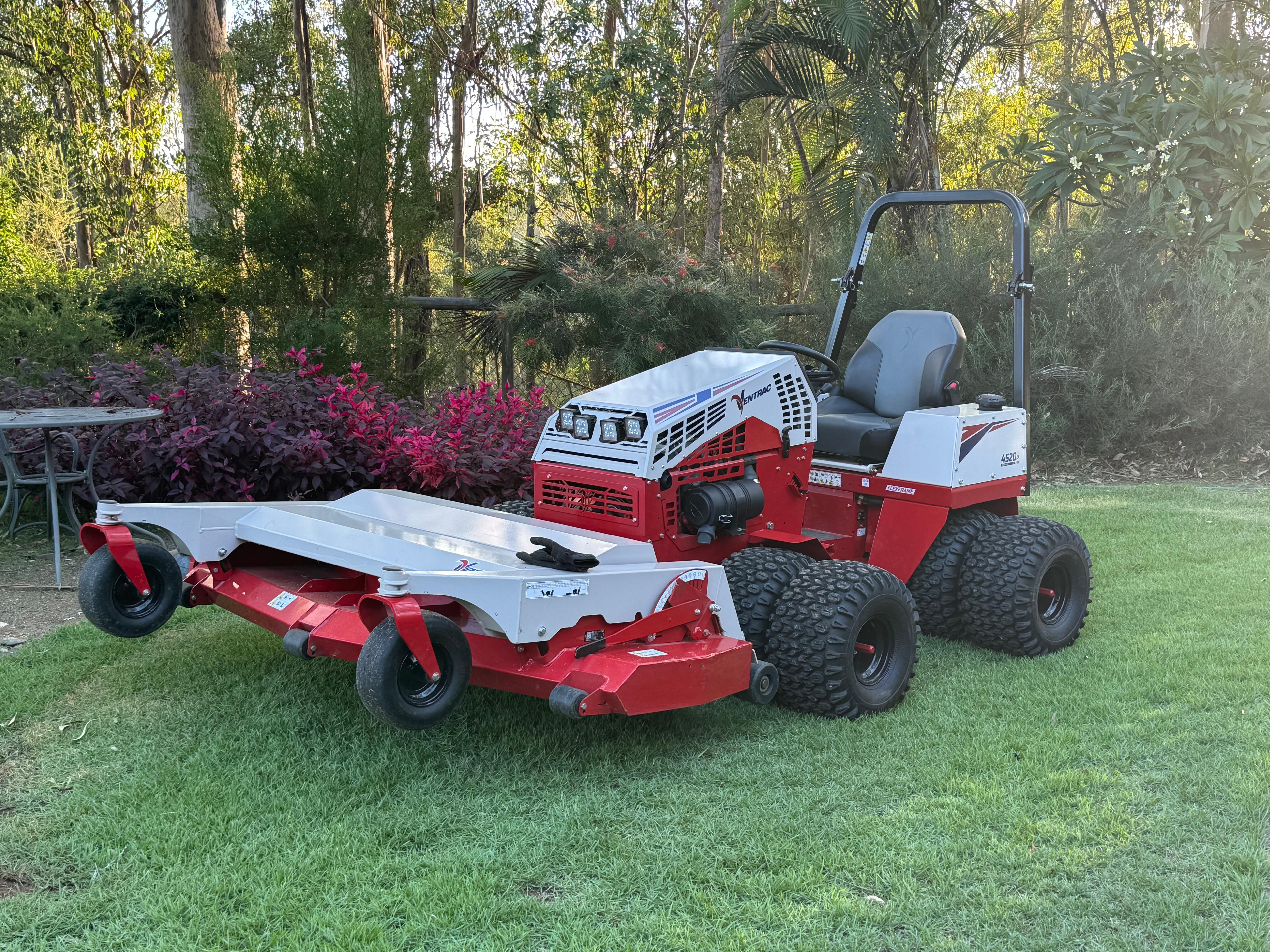 Ventrac 4520P fitted with the finish mower deck, parked on lawn